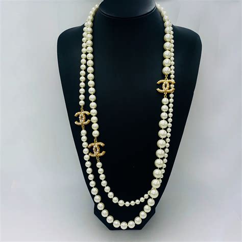 collier vintage chanel|Chanel pearl long strand necklaces.